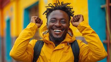 Man With Dreadlocks and Yellow Jacket photo