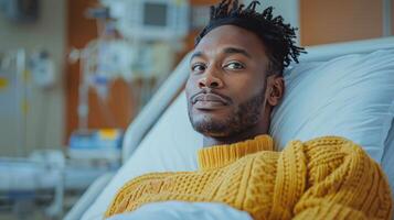 hombre con rastas tendido en hospital cama foto