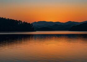 Sunset Over Lake With Mountains photo