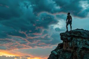 Man Standing on Top of Rock Under Cloudy Sky photo