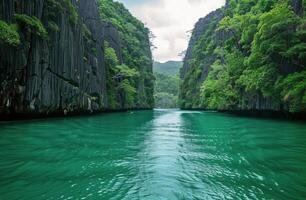 Boat Traveling Down River Surrounded by Mountains photo