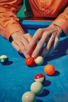 Focused Pool Player Lining Up for a Shot on Blue Table photo