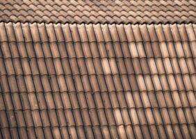 brown red tiled roof texture background photo