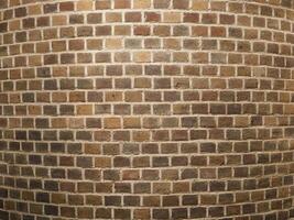 round dark red brick wall background photo