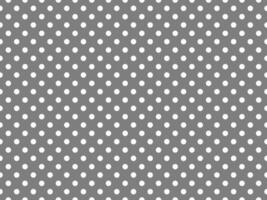 texturised white color polka dots over gray background photo