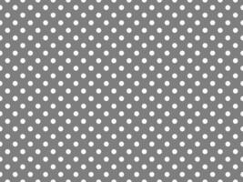 texturised white color polka dots over gray background photo