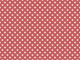 texturised white color polka dots over indian red background photo