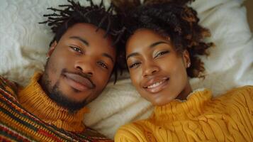 Smiling Couple in Matching Yellow Sweaters photo