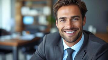 Smiling Businessman in Modern Office During Workday photo