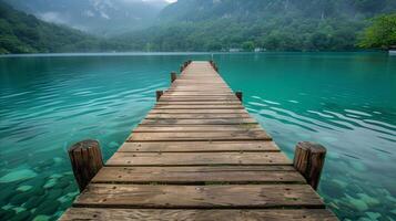 Serene Lake Pier on a Foggy Morning photo