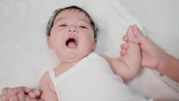 Close-up photo of cute little girl on bed video