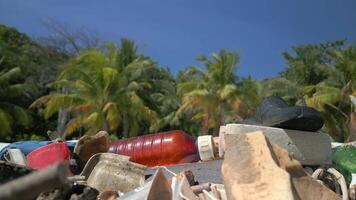 Rubbish on tropical beach on paradise island in Asia video