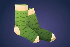 Warm knitted green socks. isolated cartoon illustration, clothing accessory. vector