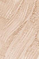 Chic abstract background of loose powder in natural tone. Vertical view. A copy of the space. Cosmetic background. Layout for design. photo