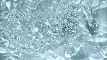Super slow motion a jet of hot water with air bubbles. High quality FullHD footage video