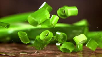 Super slow motion green onions. High quality FullHD footage video