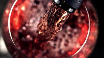 Super slow motion red wine pours with air bubbles into the glass. Macro background. Top view.Filmed on a high-speed camera at 1000 fps. High quality FullHD footage video