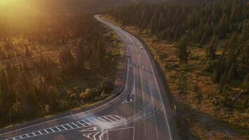 Nice top view of the crossroads on a sunny evening. The rays of the setting sun video