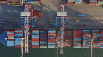 Loading and unloading a container ship in the port at the pier. Time lapse video