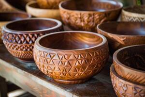 Handcrafted wooden bowls on a table photo