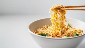 Cooked instant noodles sprinkled with spices, vegetables, herbs. photo