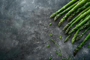Vegetables. Green asparagus on the table. photo