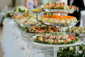 Catering buffet food indoor in luxury restaurant with meat colorful fruits and vegetables. photo