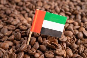 UAE United Areb Emirates or Great Britain flag on coffee bean, import export trade online commerce. photo