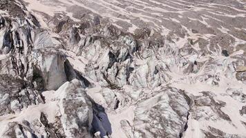 Beautiful cinematic aerial view of the icefall on the Mizhirgi Glacier video