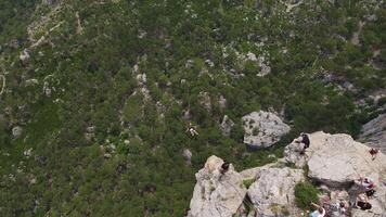 Extreme jumping with a rope from a cliff. Drone view. Shaan-Kaya, Crimea video