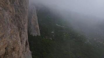 Extreme jumping with a rope from a cliff. Drone view. Shaan-Kaya, Crimea video