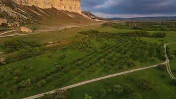 White vertical rocky wall rising above the valley. Crimean peninsula video