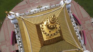The dome and spire of the temple of the Golden Abode of Shakyamuni Buddha video