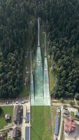 Aerial view of ski jump in the Polish mountains in summer video