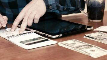 man separating money into budgets 4k Background video