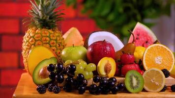 Fresh sliced fruit placed on a table 4K background video