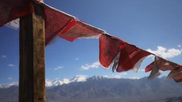 Plenty of colorful Buddhist prayer flags at temple video