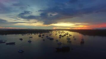 slow motion sunset surrounded by fishermen video