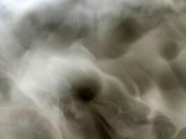 Abstract fog or smoke on black color background photo