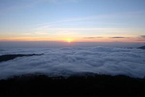 Morning Sunrise, Sky High Serenity, Clouds Over Mountain Tops, Hiking Adventure photo