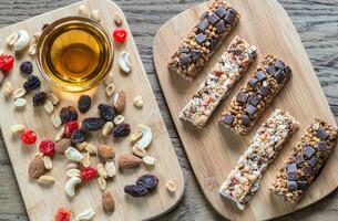 Granola bars with dried berries and chocolate photo