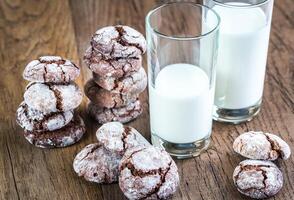 Chocolate cookies with glasses of milk photo