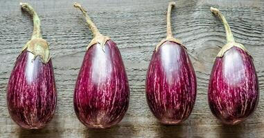 Graffiti Eggplants flat lay photo