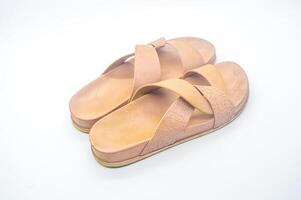 A pair of light brown girls' sandals looks sexy photo