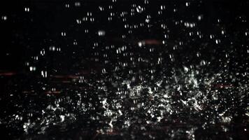 Drops of water on a black background. Filmed is slow motion 1000 fps. High quality FullHD footage video