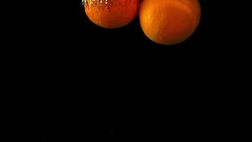 Super slow motion orange slices fall. High quality FullHD footage video