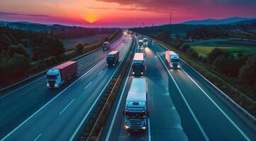 Long haul container truck carrying commercial cargo delivery between cities on a freeway photo