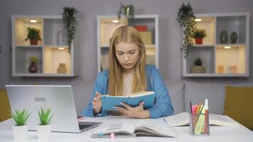 Books and unhappy Female student. video