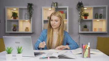 Female student doing research. video