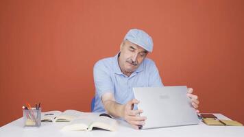 Man joyfully embracing laptop. video